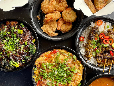A plate of food representing the cuisine of the restaurant Black Dragon Takeout, a Philadelphia restaurant participating in the Philadelphia Inquirer Food festival, November 15th, 2025, at the Fillmore.