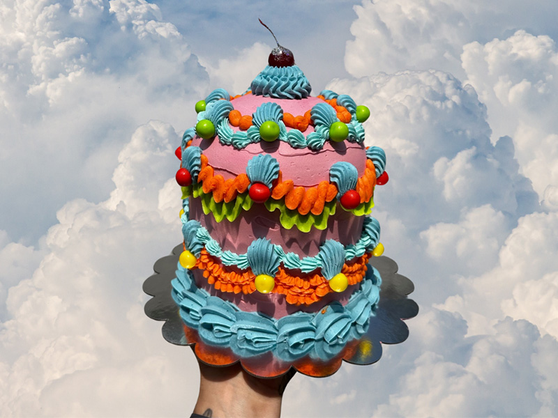 A picture of a gorgeous three-tier cake representing the offerings of Party Girl Bake Club, a Philadelphia bakery participating in the Philadelphia Inquirer Food festival, November 15th, 2025, at the Fillmore.